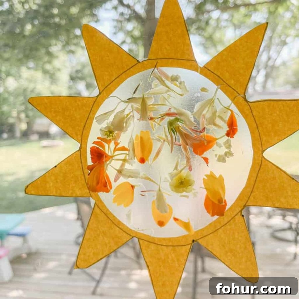 16 Paper Flower Crafts to Make This Spring 11 Sun Suncatcher