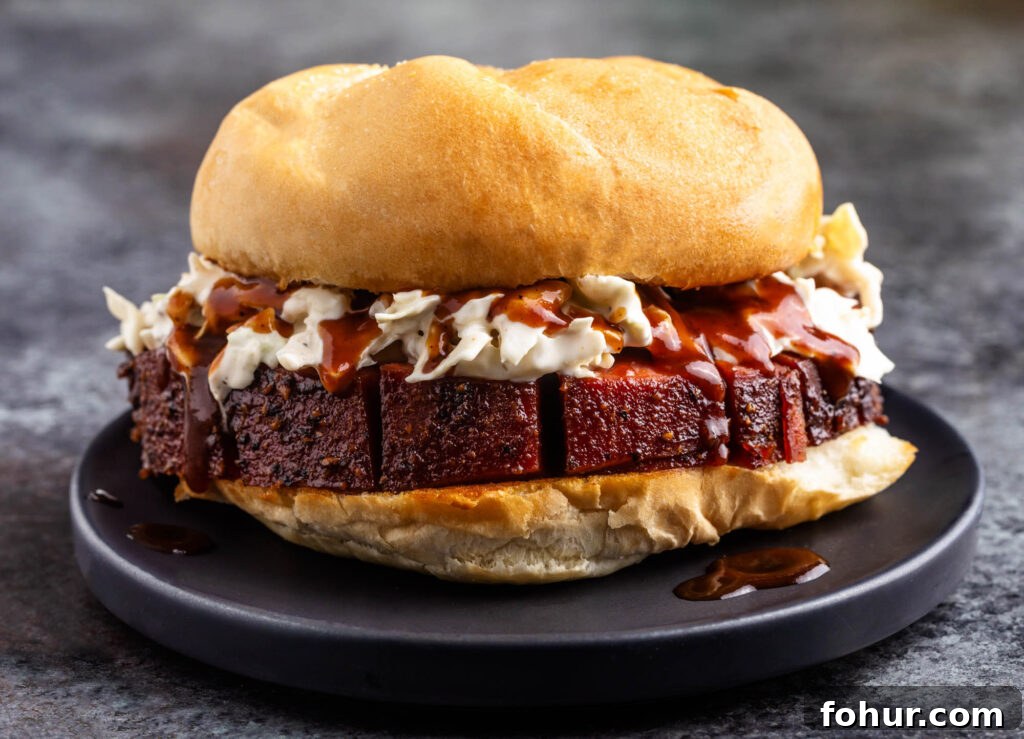 How to Smoke Bologna for Tender, Smoky Flavor 4 smoked bologna sandwich with cole slaw and bbq sauce