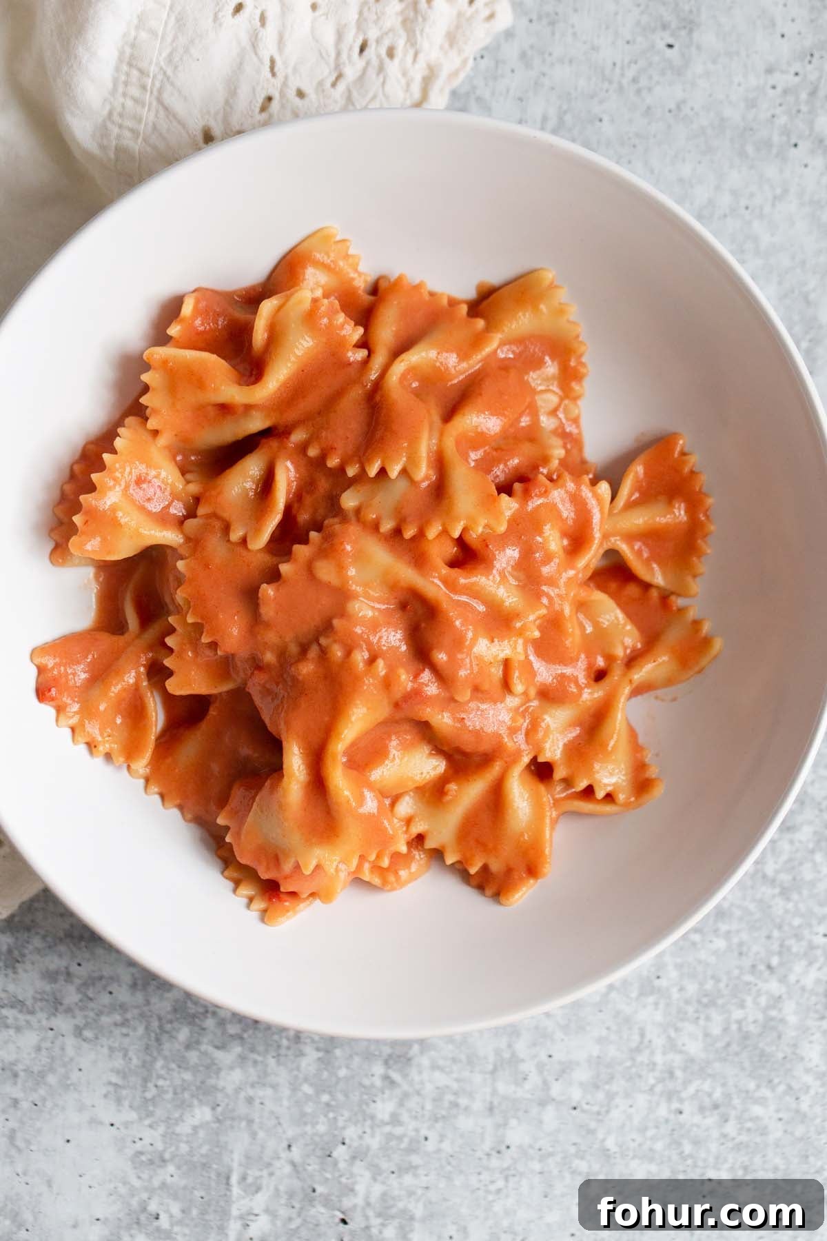 Creamy Harissa Pasta Recipe 2 cooked farfalle pasta with sauce