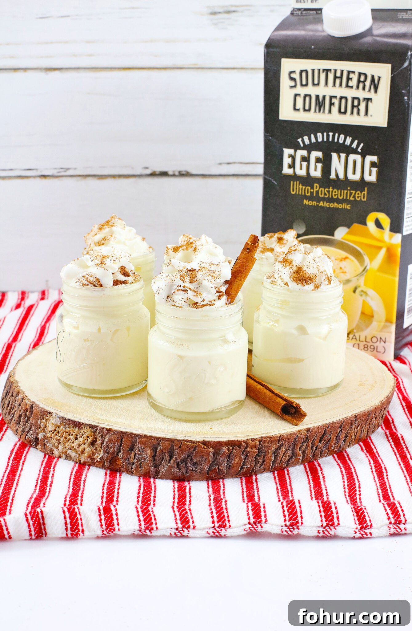 Creamy Eggnog Pudding Shots for Holiday Parties 6 eggnog pudding shots on table