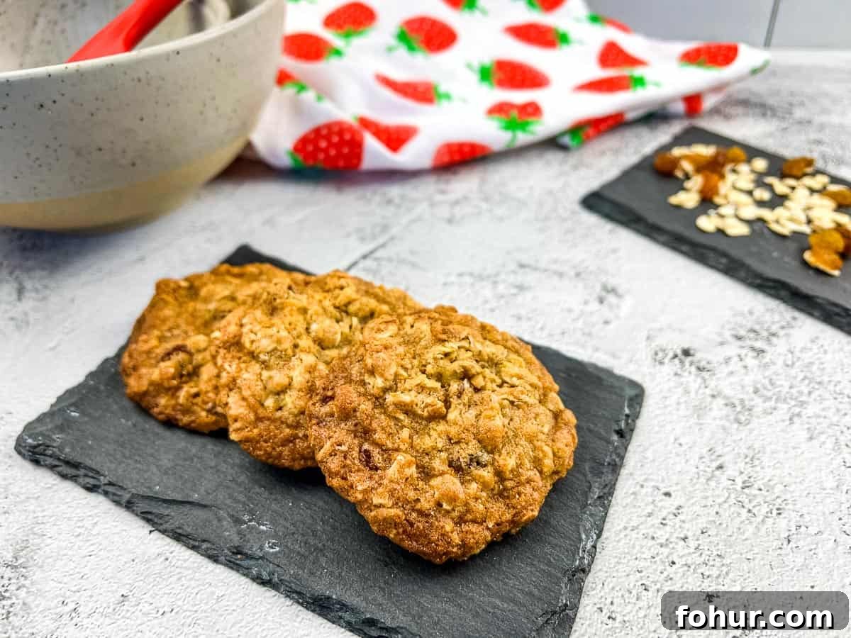 19 Cookie Recipes Even Dessert Skeptics Can't Resist 14 Oatmeal Raisin Cookies on a slate.