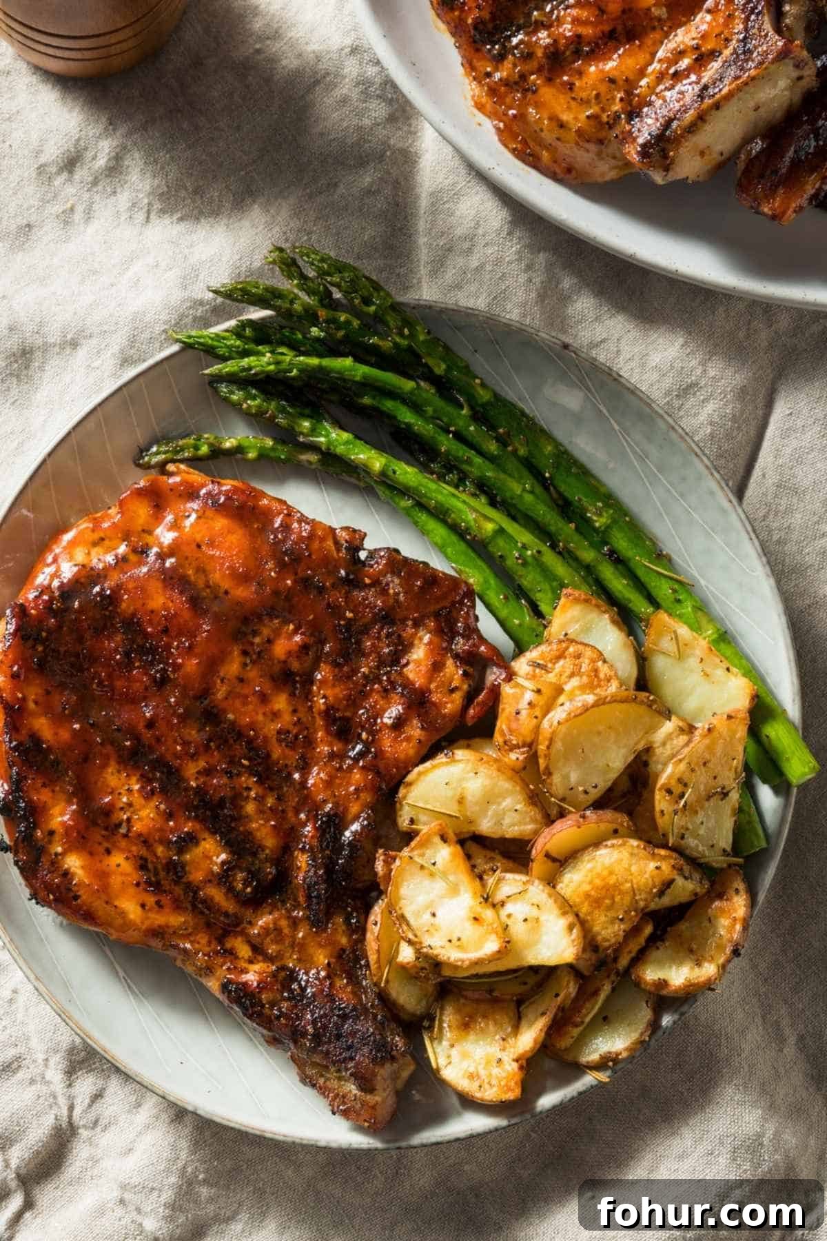 texas roadhouse grilled pork chop on a plate